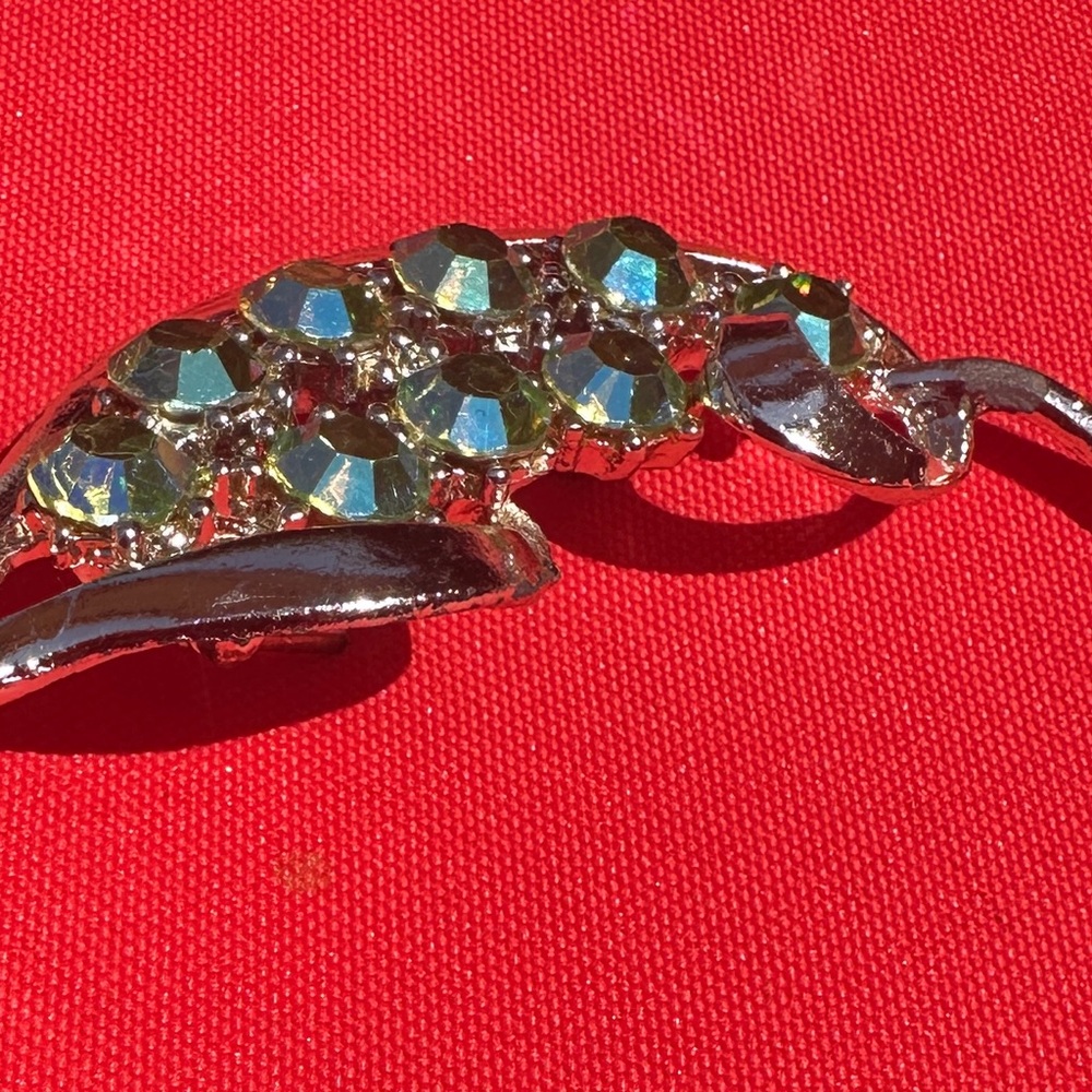 1950 Stylish Leaf Design Brooch. Gold Tone Metal With Blue/Green AB Glass